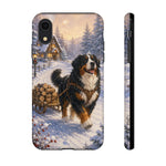 Bernese Mountain Dog Winter Scene phone case | snowy cabin, log cart