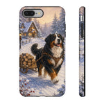 Bernese Mountain Dog Winter Scene phone case | snowy cabin, log cart