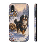 Bernese Mountain Dog Winter Scene phone case | snowy cabin, log cart