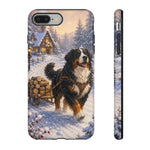 Bernese Mountain Dog Winter Scene phone case | snowy cabin, log cart